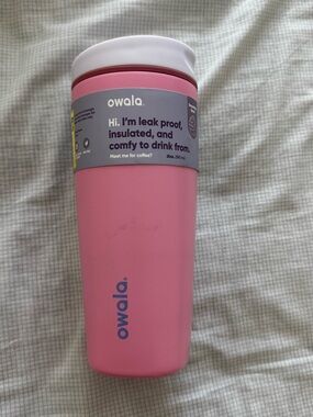 Owala Pink Insulated Leak-Proof Travel Mug.